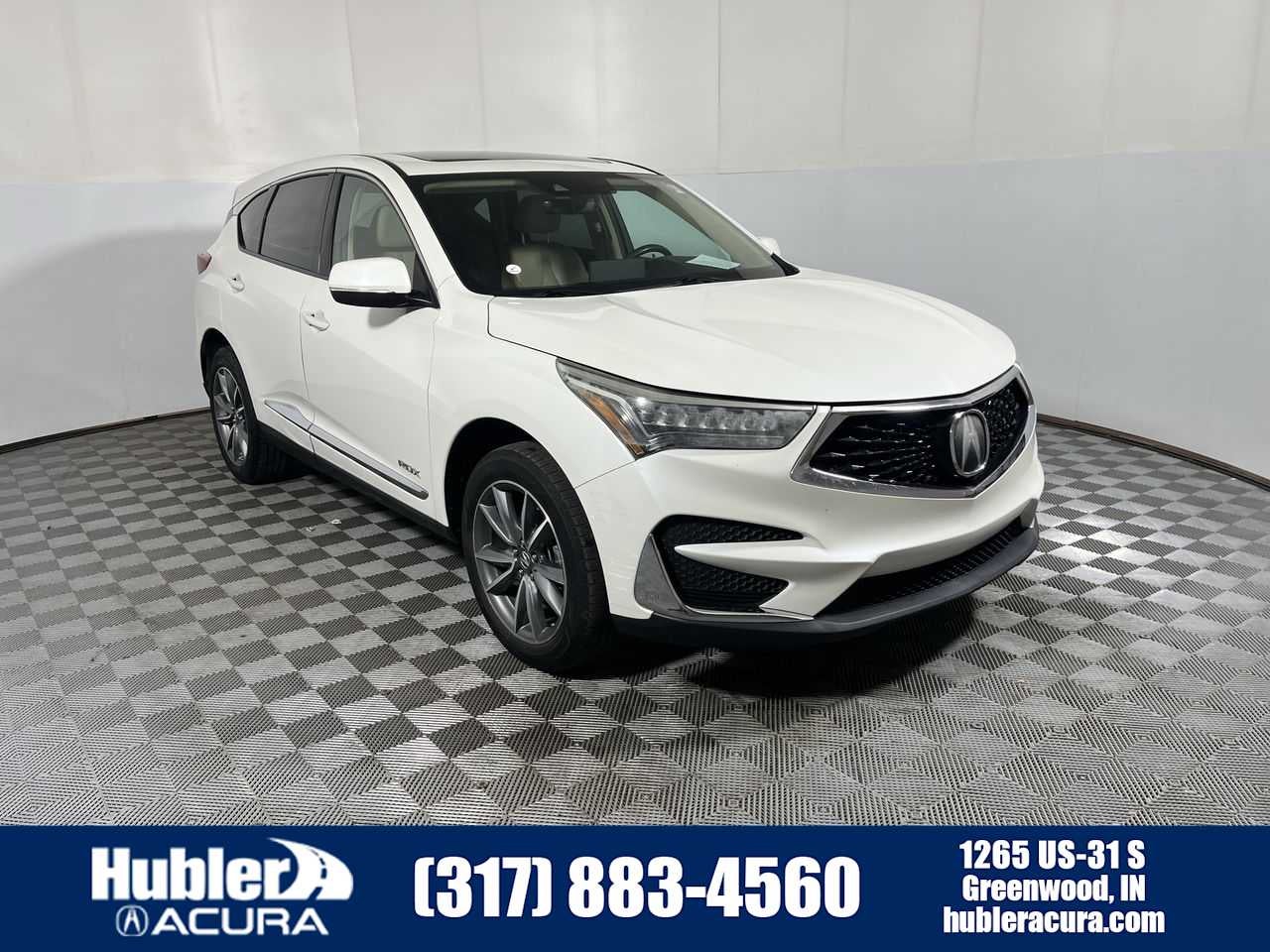 2019 Acura RDX w/Technology Pkg in White — front three-quarter view