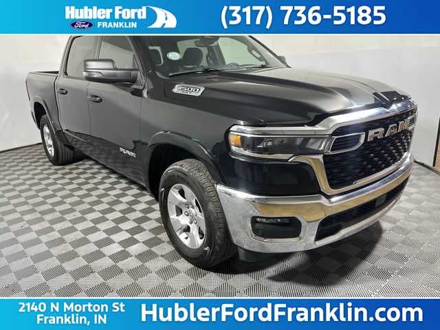 2025 RAM 1500 Big Horn in Diamond Black Crystal Pearlcoat — front three-quarter view