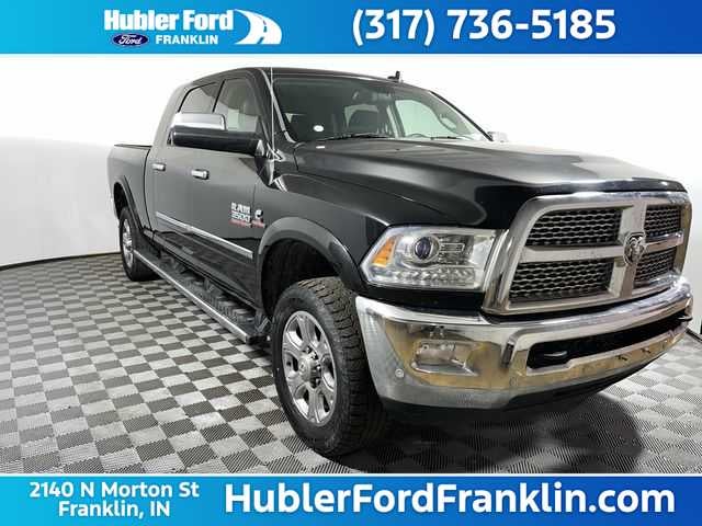 2016 RAM 3500 Laramie in Brilliant Black Crystal Pearlcoat — front three-quarter view