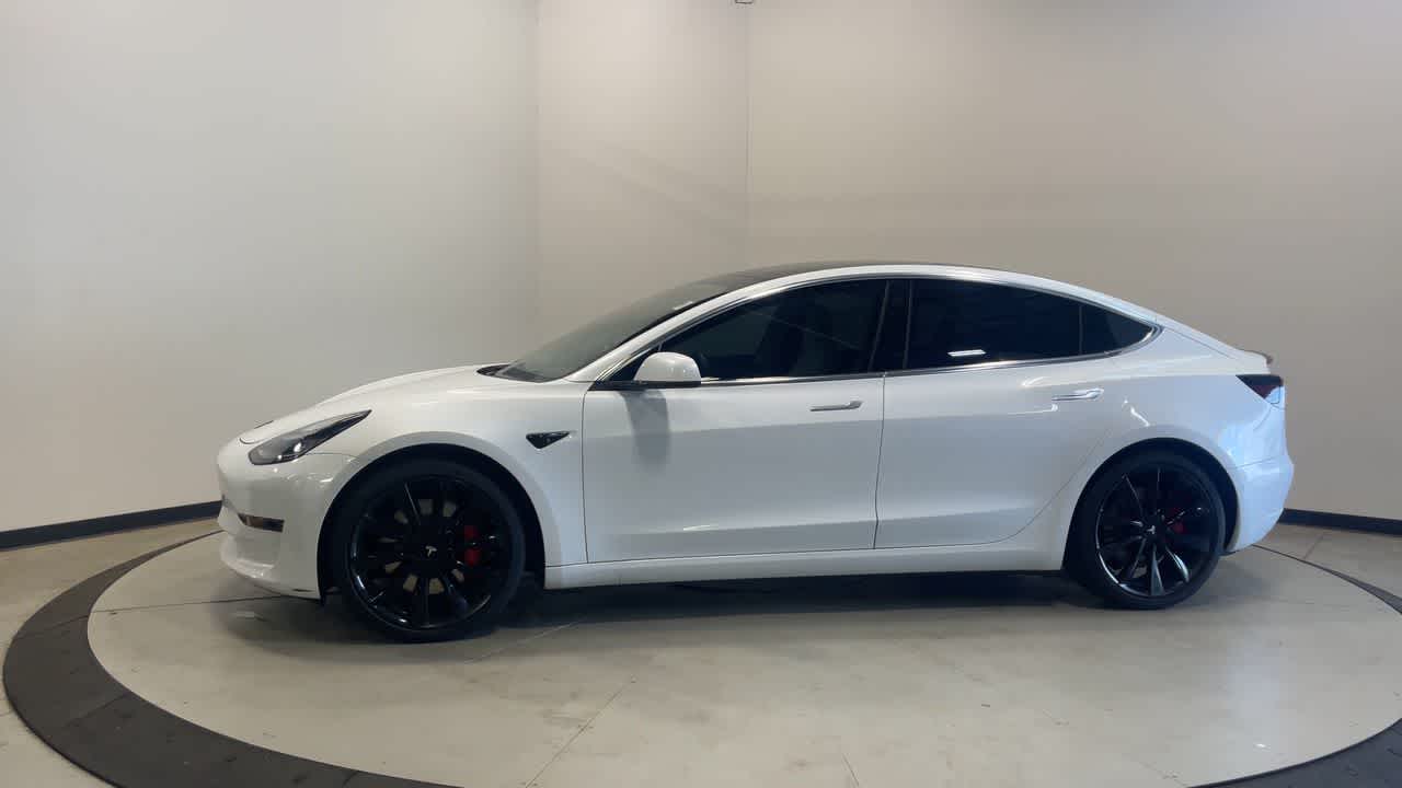 2019 Tesla Model 3 — rear three-quarter view