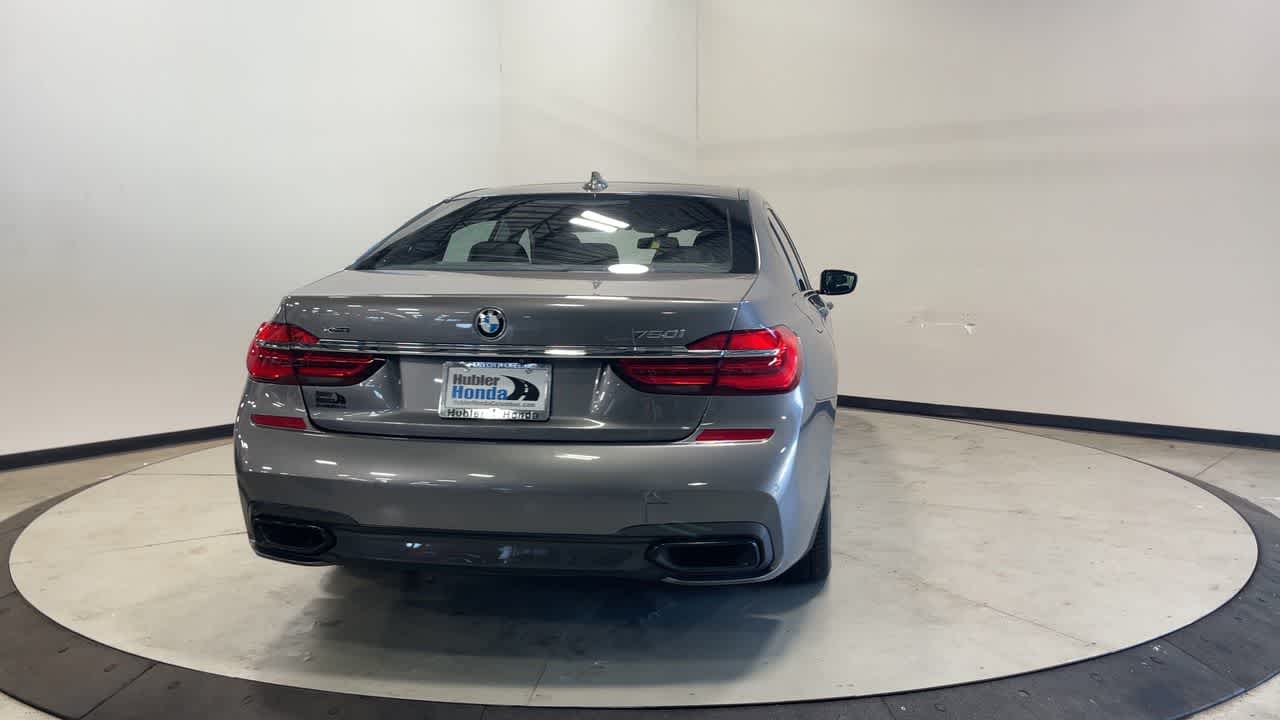 2017 BMW 750i xDrive — side profile view