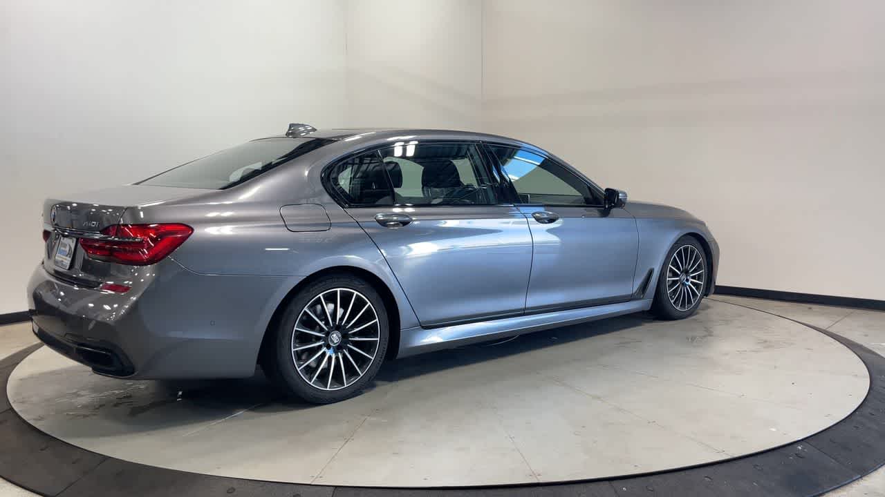 2017 BMW 750i xDrive — rear three-quarter view