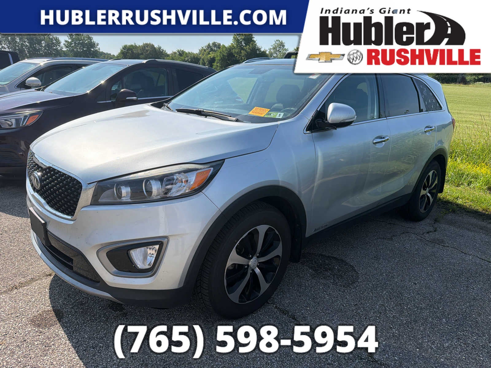 2016 Kia Sorento EX in Silver — front three-quarter view