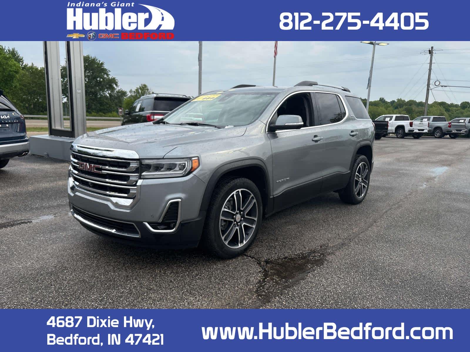 2023 GMC Acadia SLT in Sterling Metallic — front three-quarter view