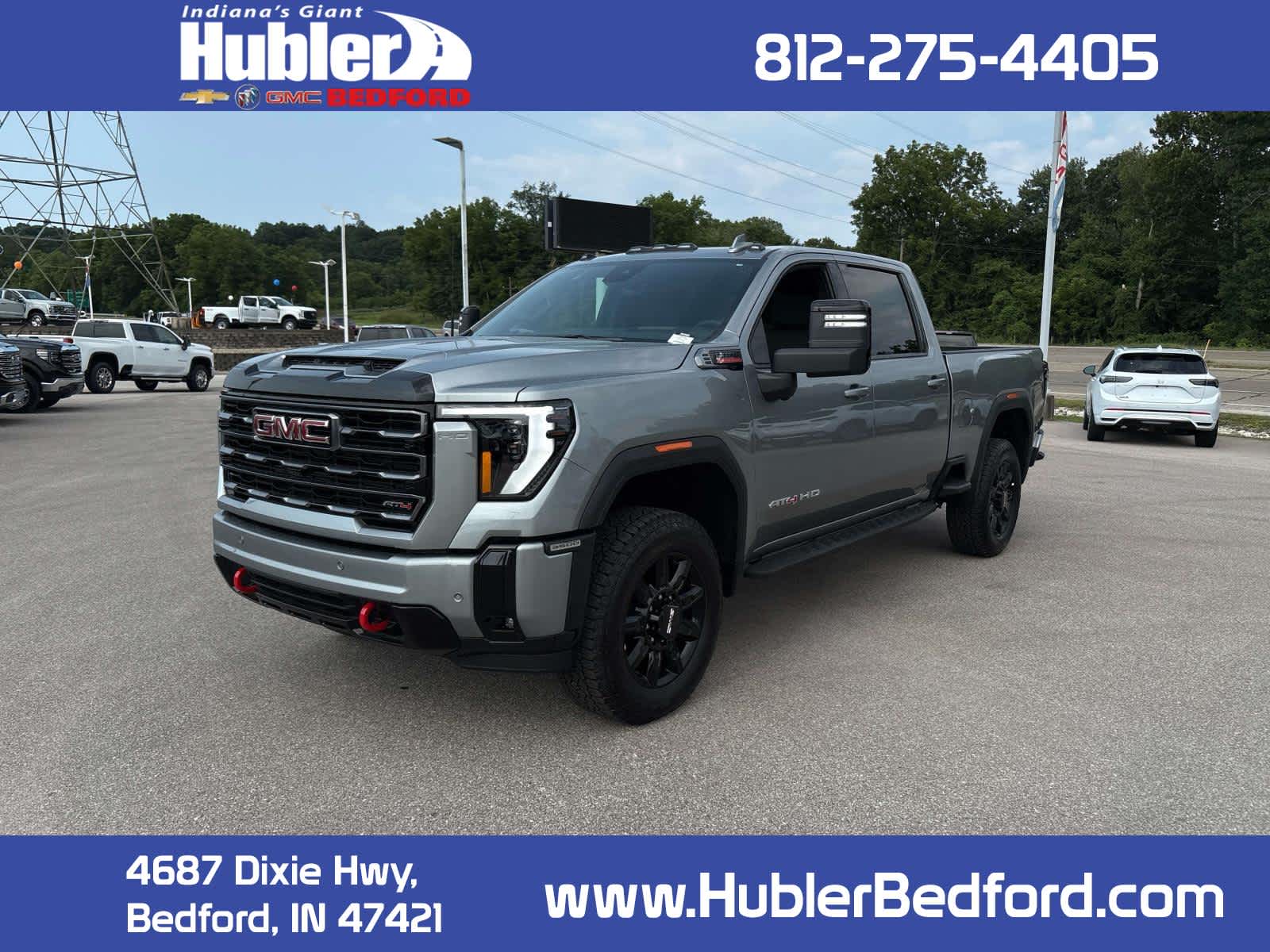 2026 GMC Sierra 3500 HD AT4 in Sterling Metallic — front three-quarter view