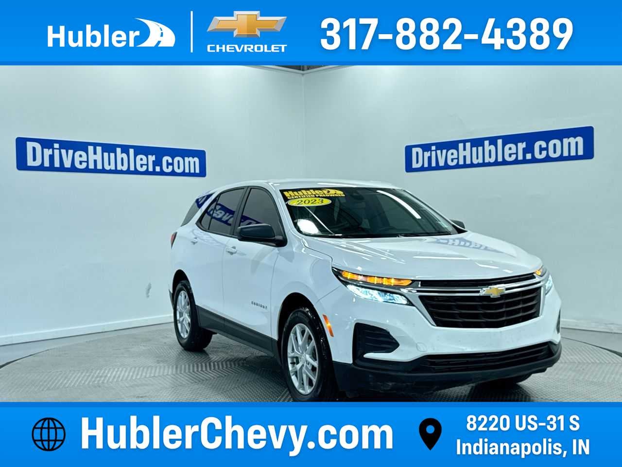 2023 Chevrolet Equinox LS in Summit White — front three-quarter view