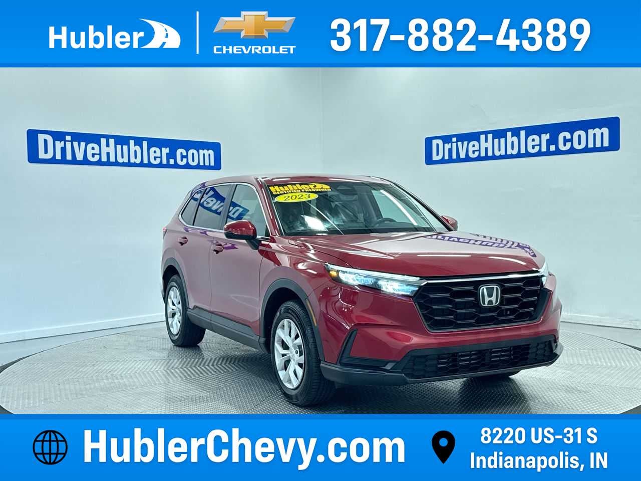 2025 Honda CR-V LX in Ruby Red Metallic — front three-quarter view