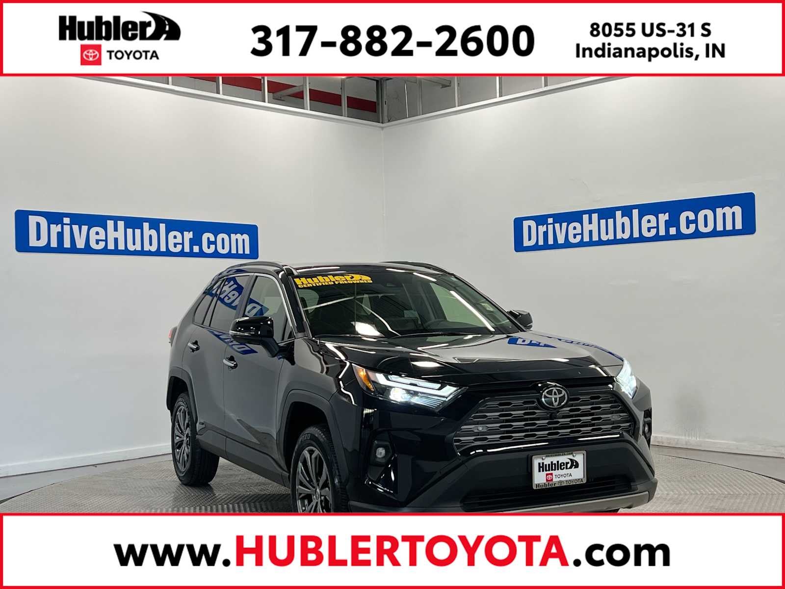 2025 Toyota RAV4 Hybrid Limited in Midnight Black Metallic — front three-quarter view
