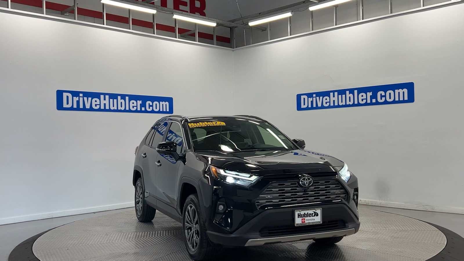 2025 Toyota RAV4 — rear three-quarter view