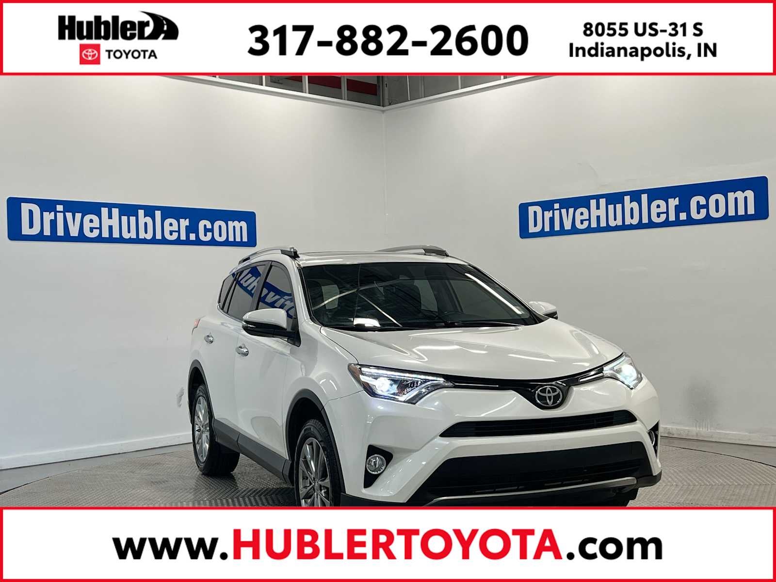 2018 Toyota RAV4 Limited in Blizzard Pearl — front three-quarter view