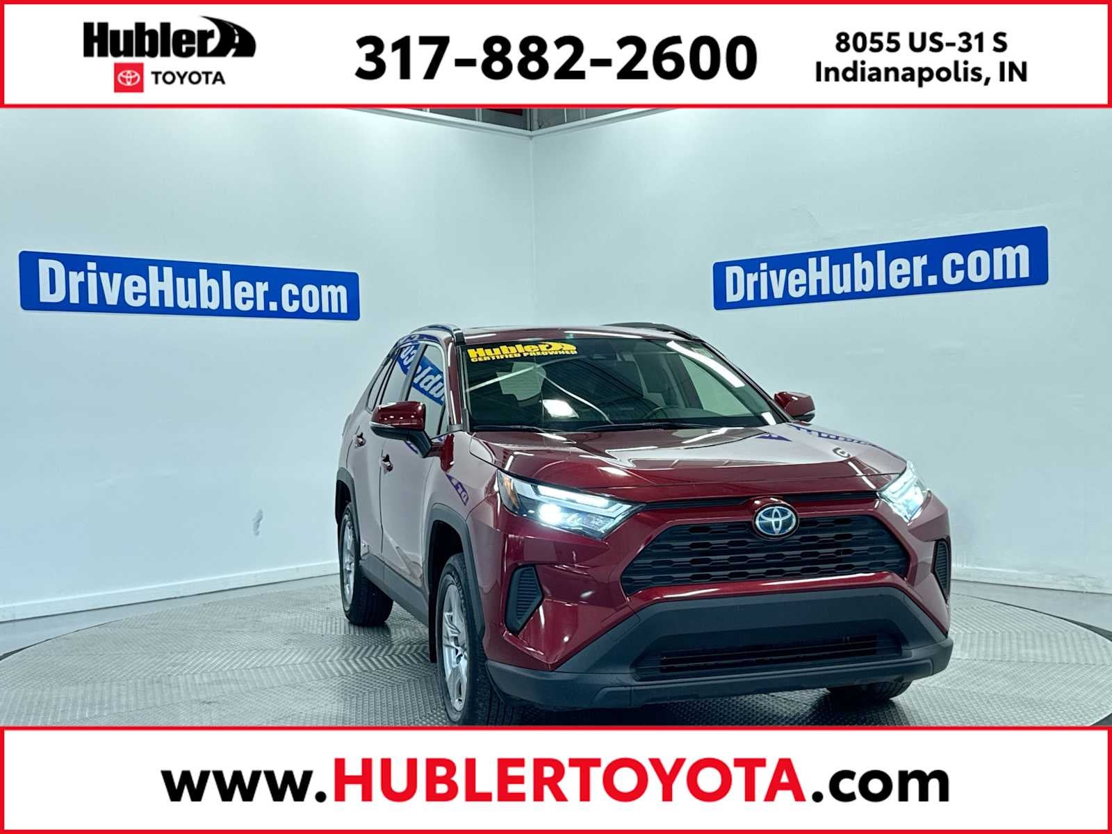 2022 Toyota RAV4 Hybrid XLE in Ruby Flare Pearl — front three-quarter view