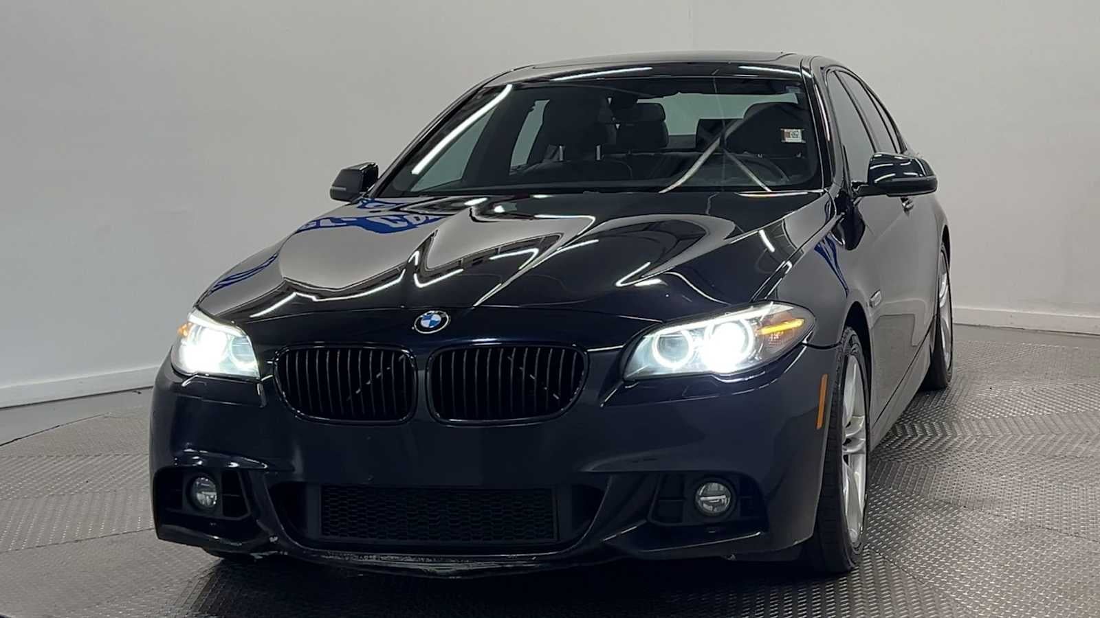 2016 BMW 528i xDrive — rear three-quarter view