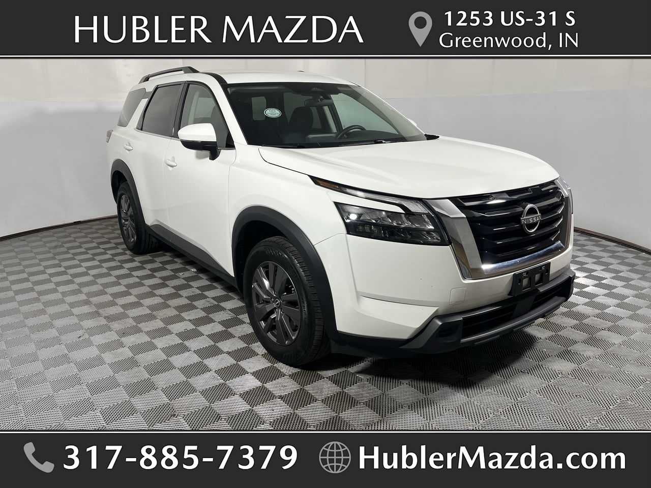 2025 Nissan Pathfinder SV in Glacier White — front three-quarter view
