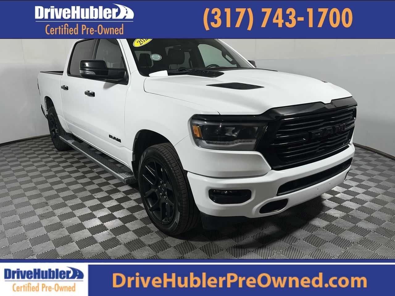 2024 RAM 1500 Laramie in Bright White Clearcoat — front three-quarter view