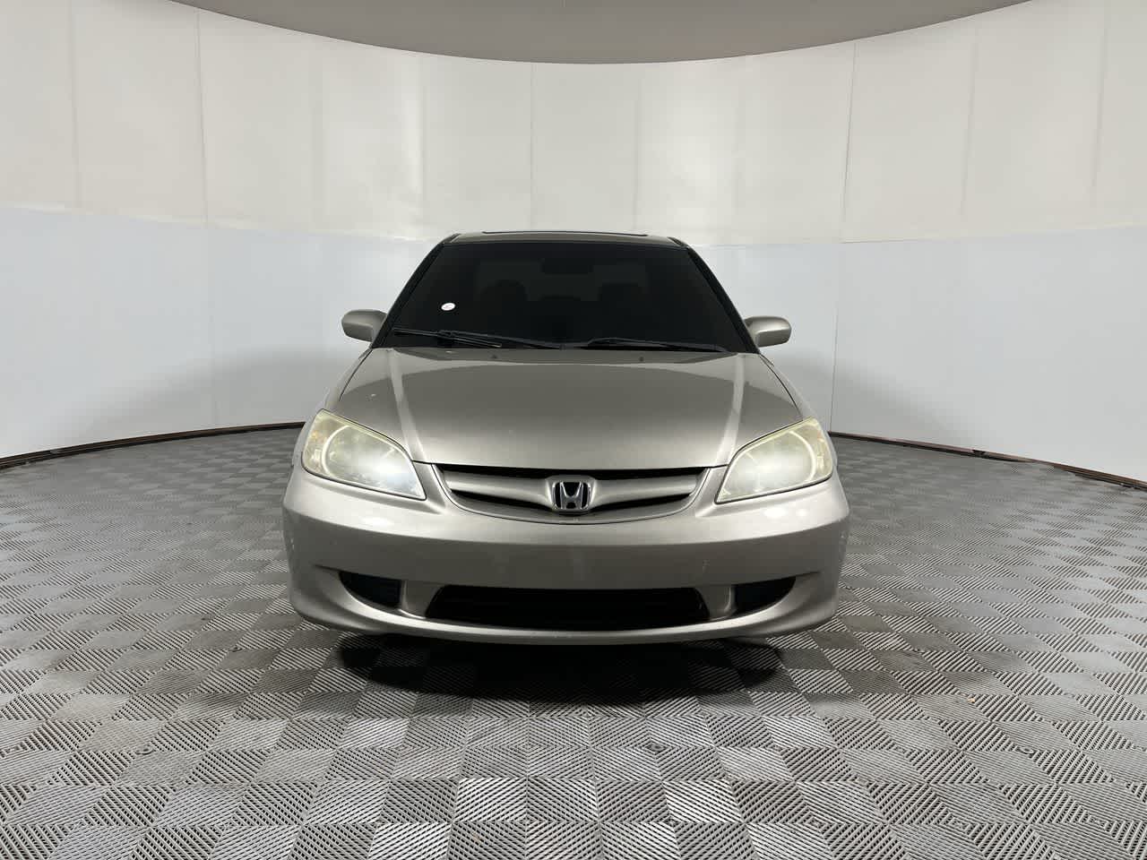 2004 Honda Civic — rear three-quarter view