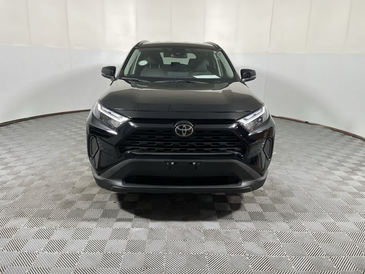 2025 Toyota RAV4 — rear three-quarter view