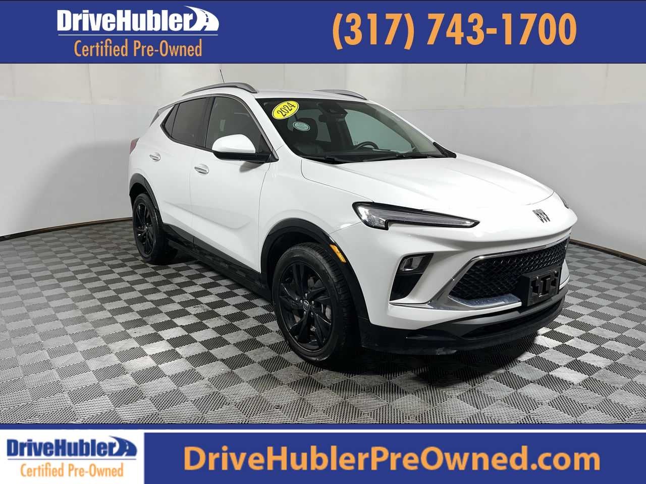 2024 Buick Encore GX Sport Touring in Summit White — front three-quarter view