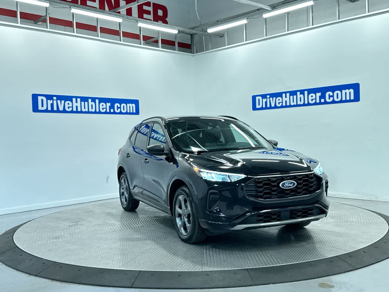 2023 Ford Escape ST-Line in Agate Black Metallic — front three-quarter view