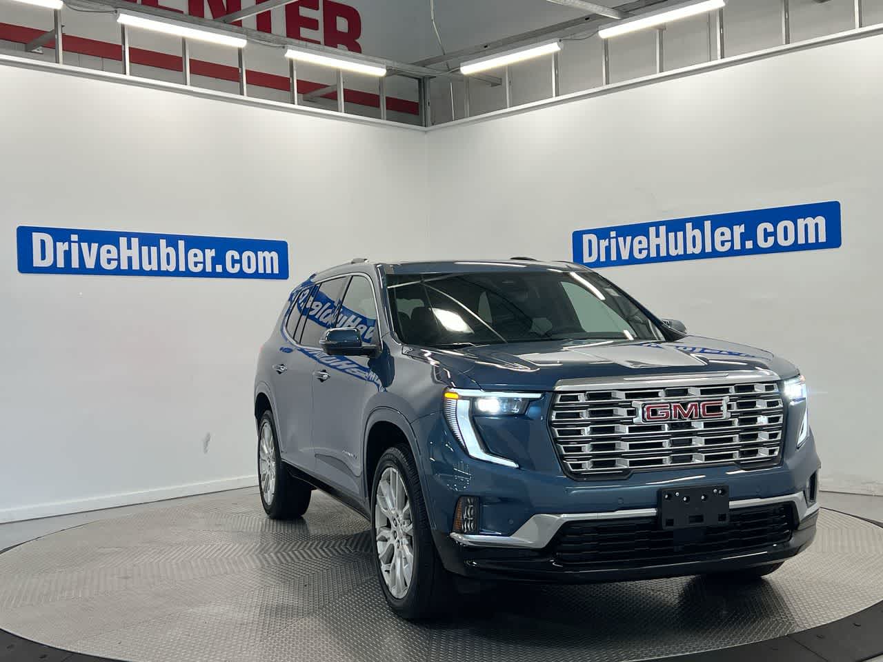 2025 GMC Acadia FWD Denali in Downpour Metallic — front three-quarter view