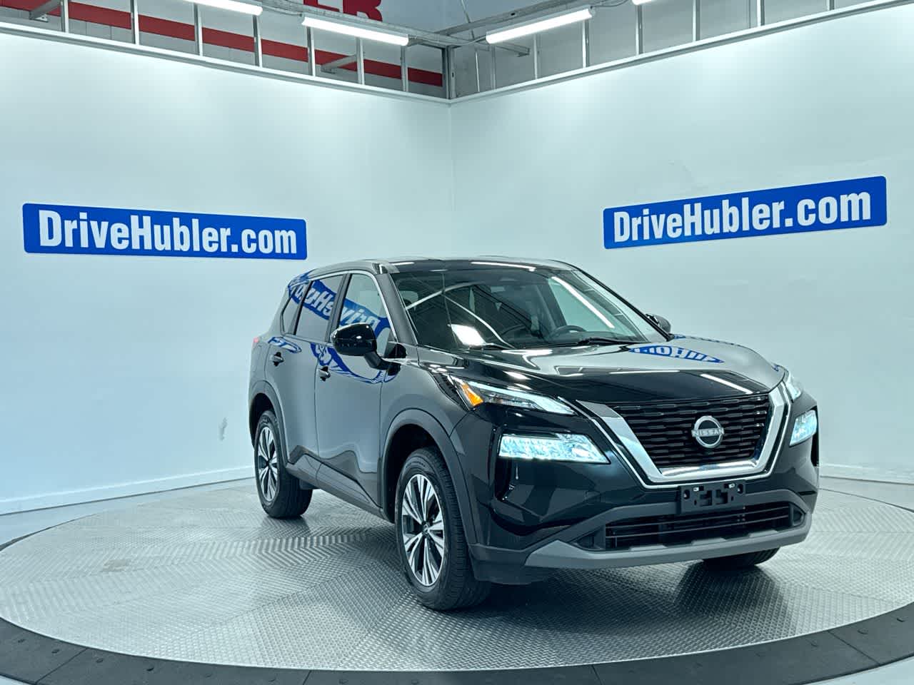 2023 Nissan Rogue SV in Super Black — front three-quarter view
