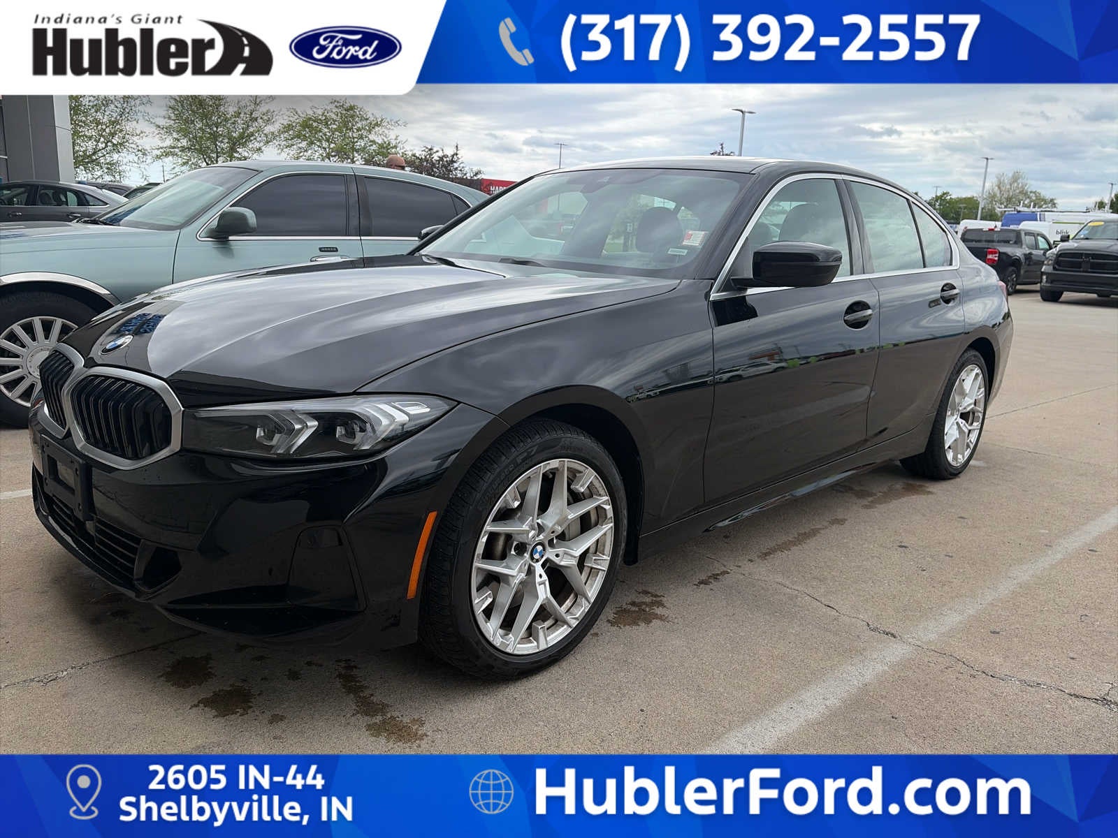 2025 BMW 330i xDrive 330i xDrive in Black — front three-quarter view