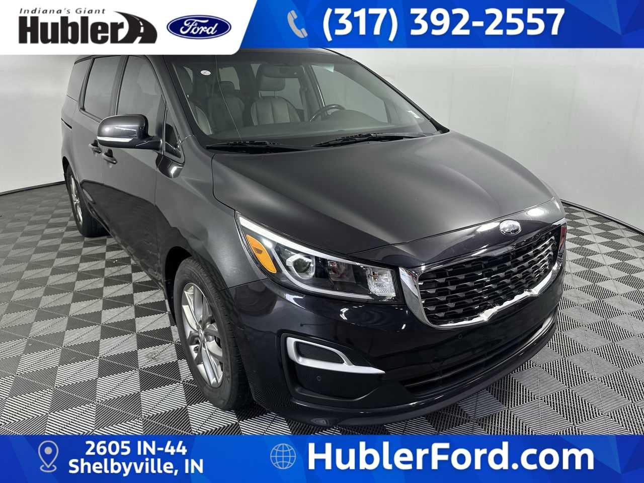 2020 Kia Sedona EX in Pantera Metal — front three-quarter view